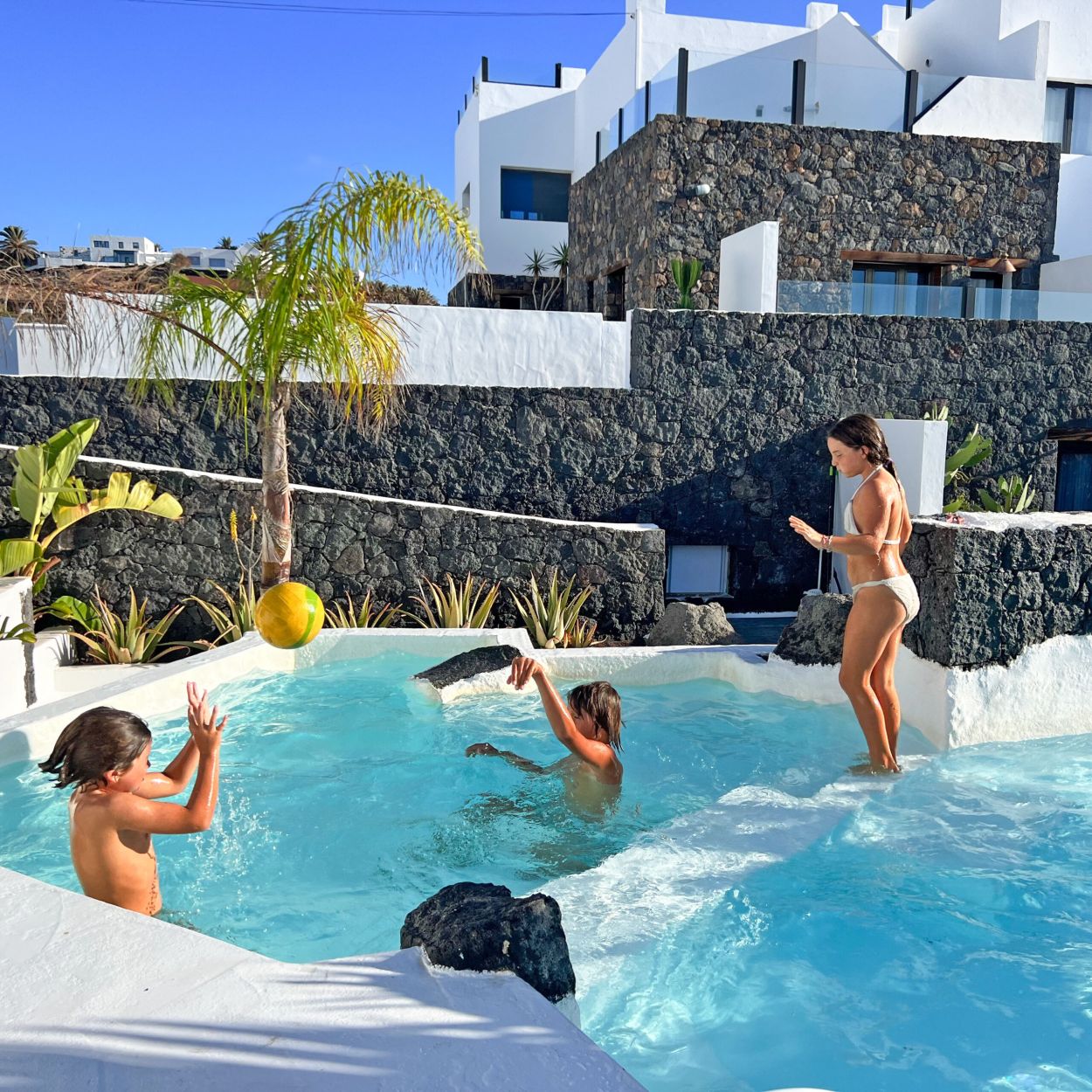 Children play in pool